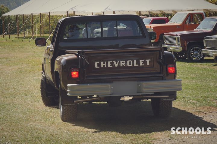 Black CHEVROLET tailgate, , people
